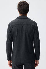 Herren-Anzugset aus anthrazitfarbenem, weichem Jersey, bestehend aus Blazer und Hose.