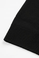 Schwarzes Herren-Poloshirt aus Strick, Kurzarm, mit Reißverschluss am Kragen, weichem Materialmix