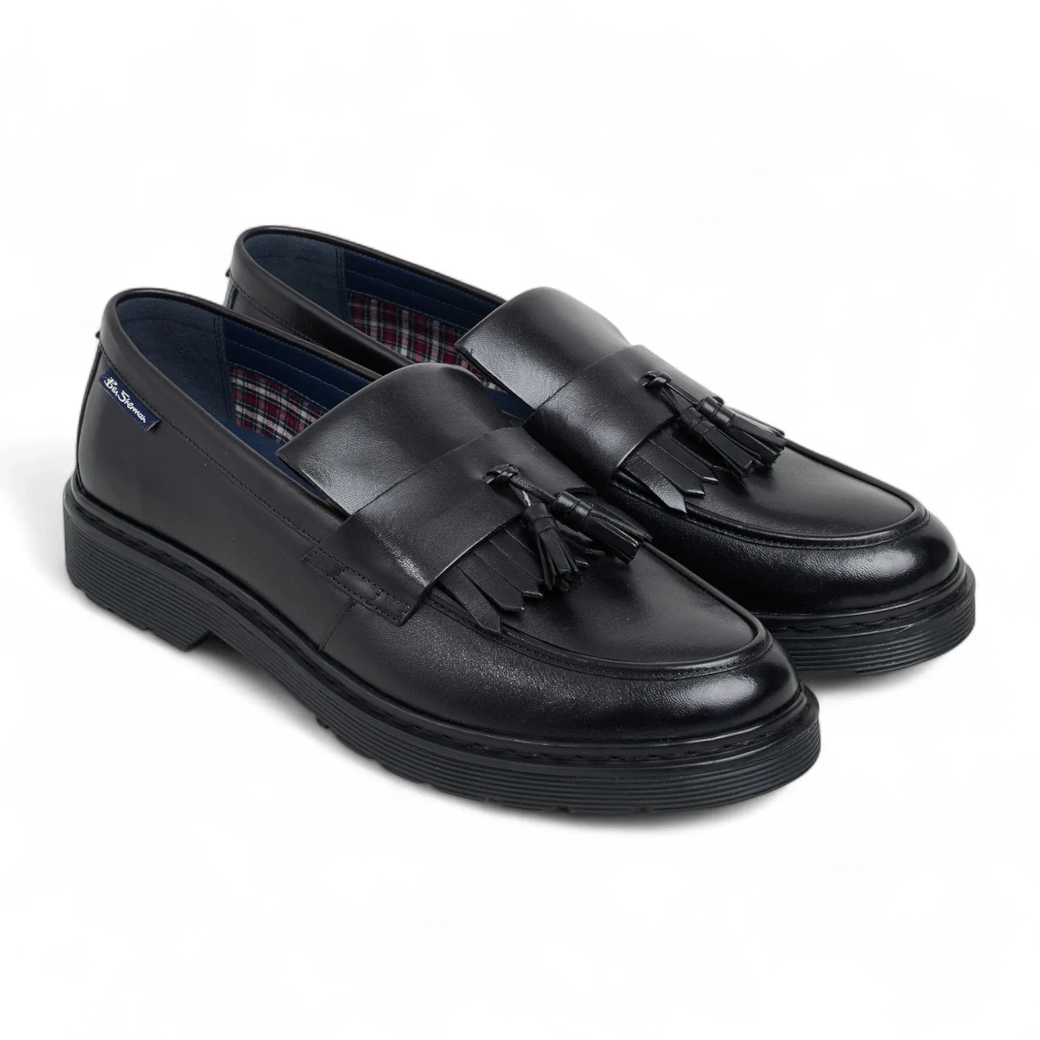 Schwarze Herren-Slipper aus Leder mit dicker Sohle und Quasten